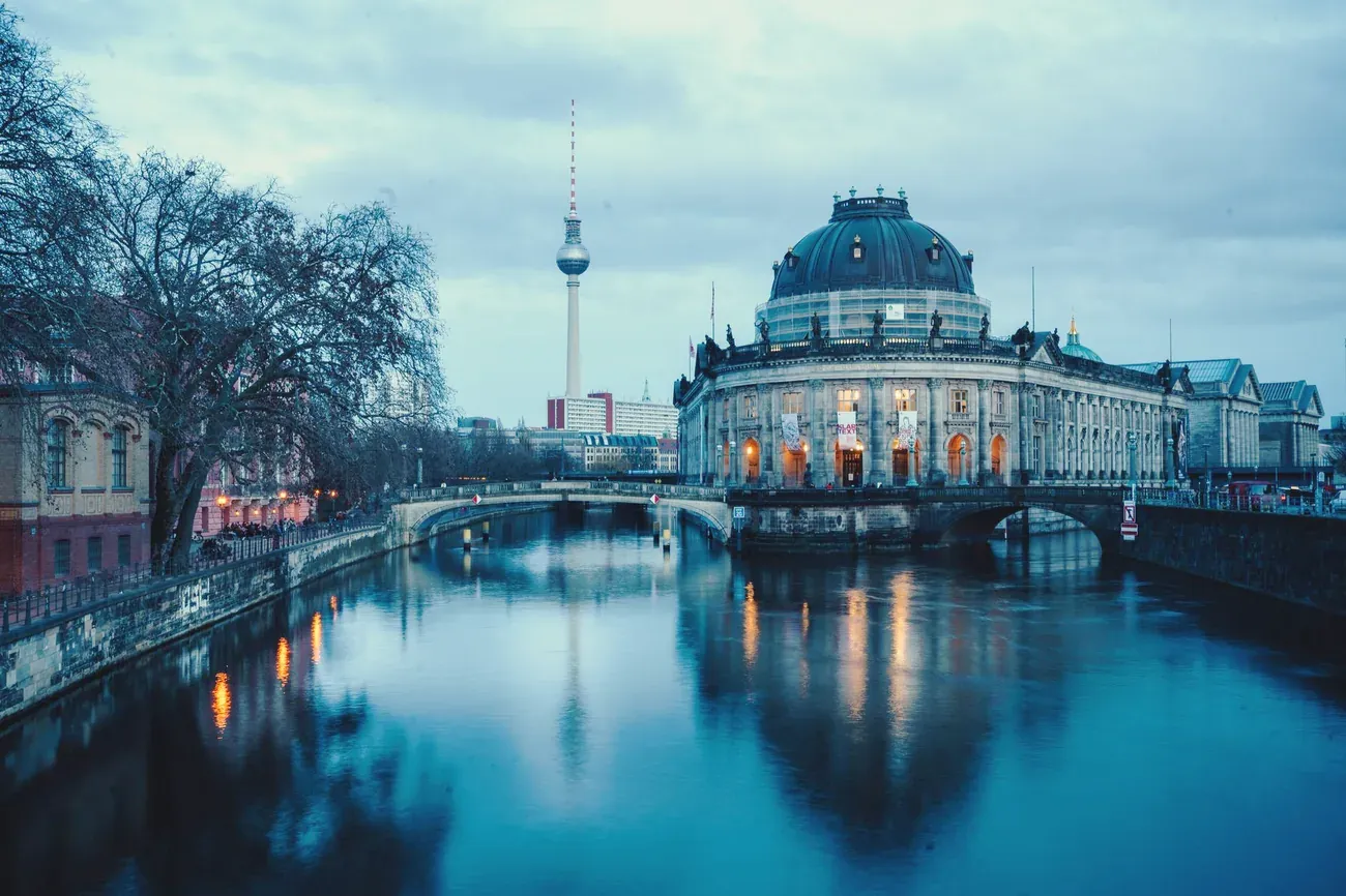 Bode Museum and Museum Island in Berlin at dawn, with the Fernsehturm in the distance