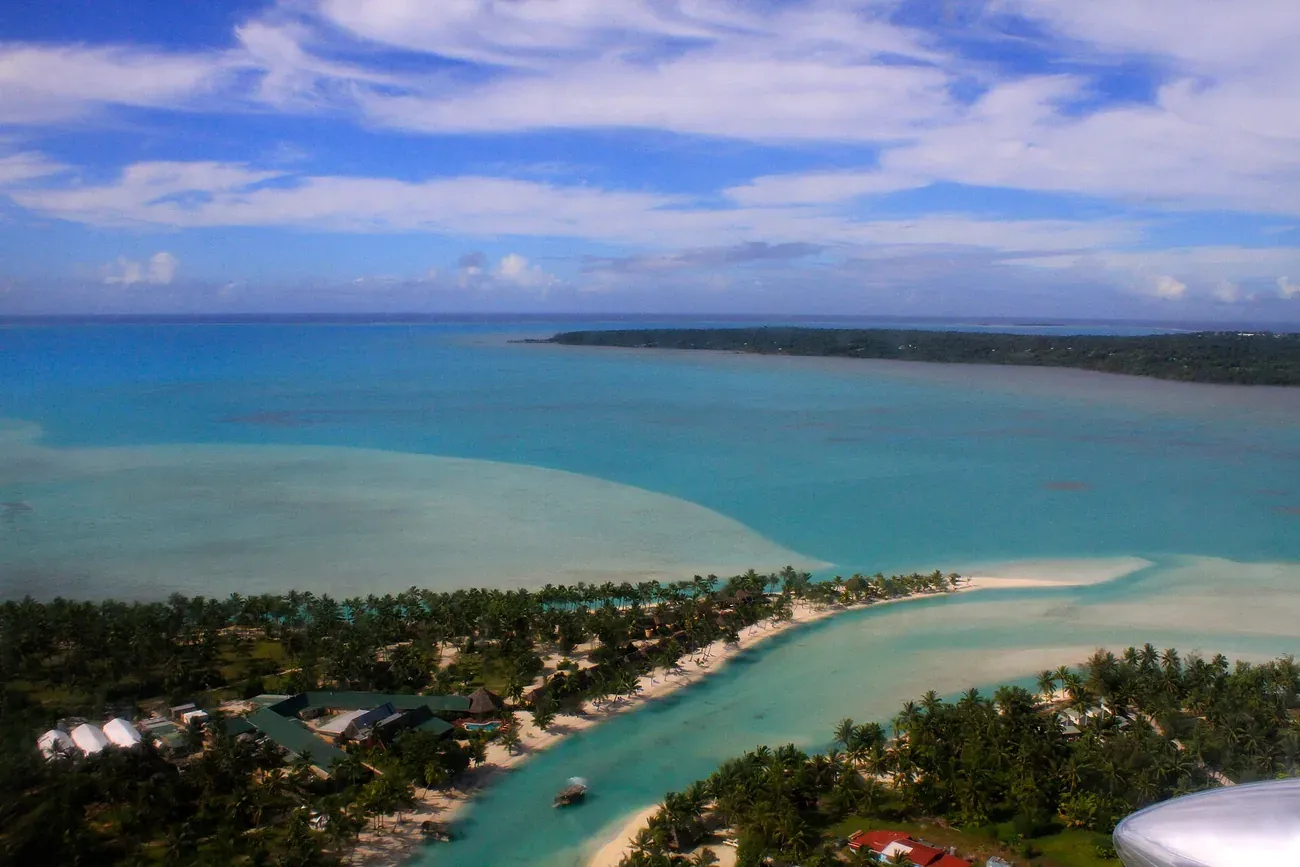 The lagoon of Aitutaki from the air, with Akitua Island on the left, Cook Islands