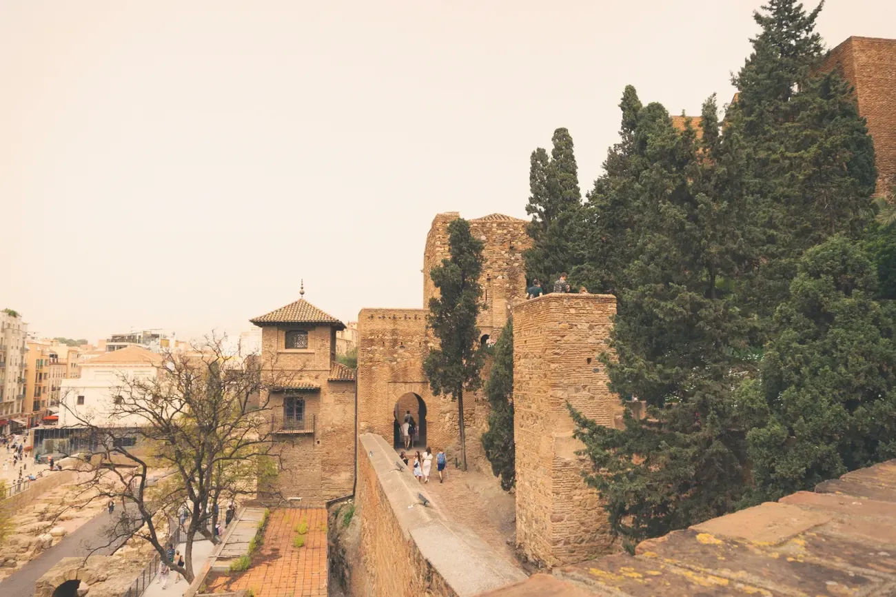 Walls, towers and gateway of the Alcazaba fortress in Malaga, Spain