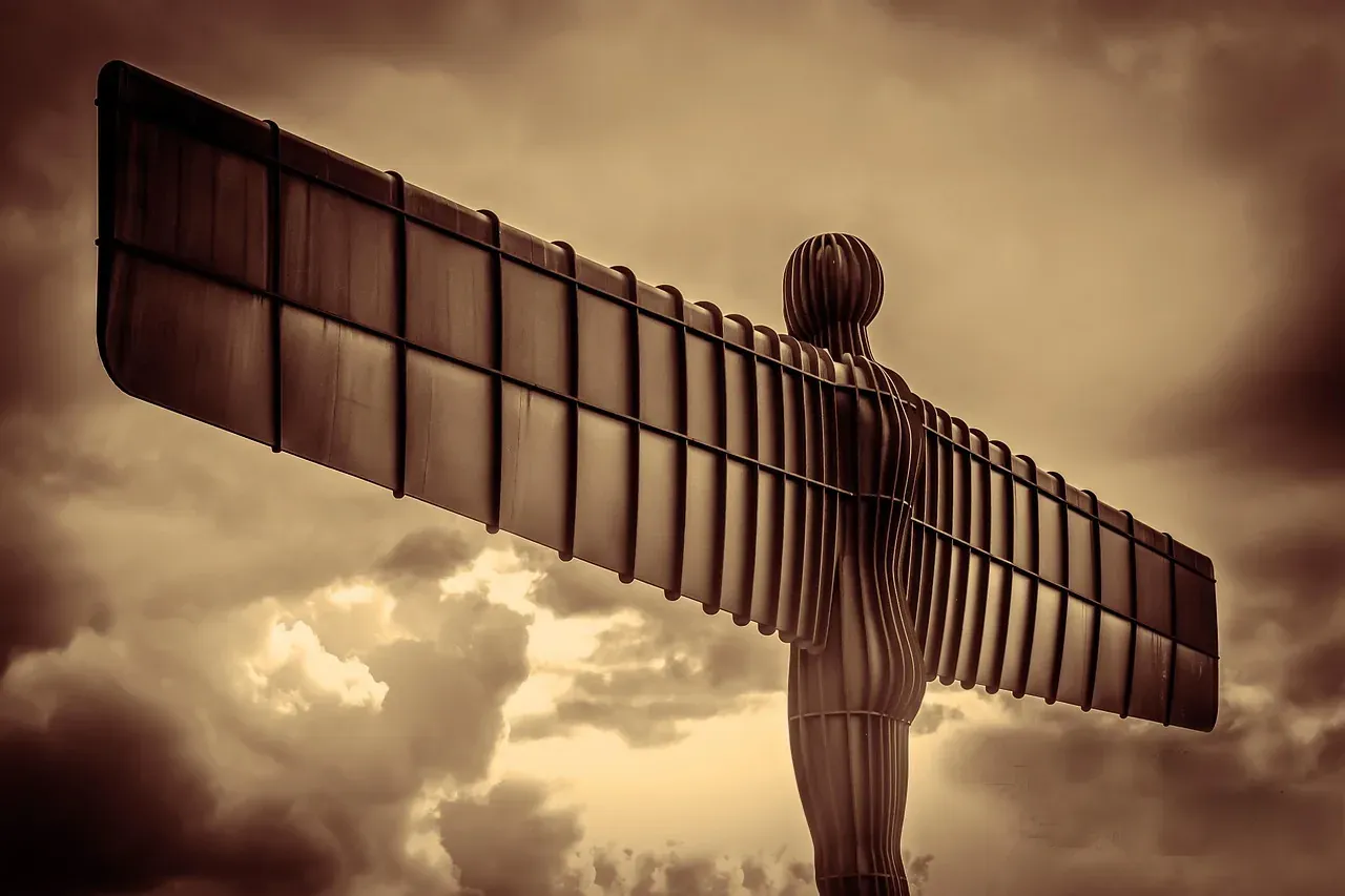 The Angel of the North steel sculpture on its hillside at Gateshead