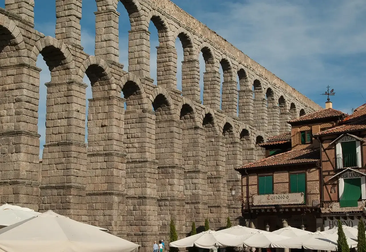 The Roman aqueduct of Segovia rising above the houses of the old town