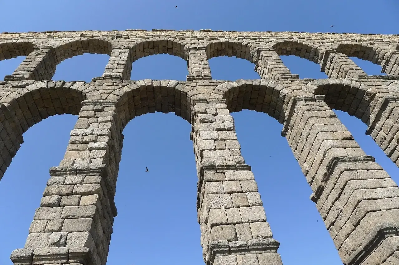 The arches of the Roman aqueduct of Segovia seen from below