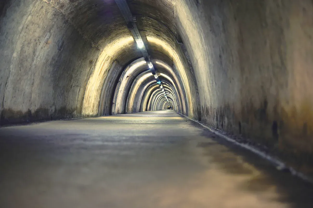 Generic arched stone underground passage (unverified, not confirmed as Spanish Quarters Underground)