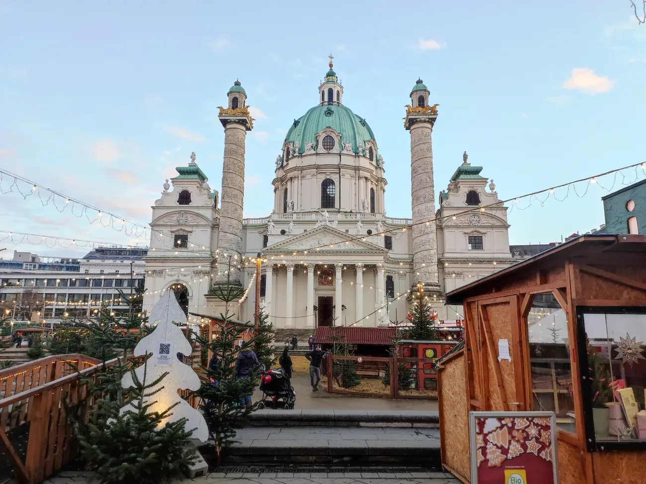 Christmas market huts in front of the Karlskirche on Karlsplatz, Vienna