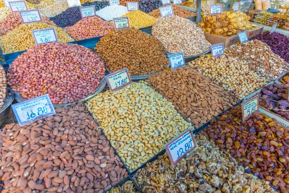 Nuts, dried fruits and raisins on a produce stall at the Varvakios Central Market, Athens