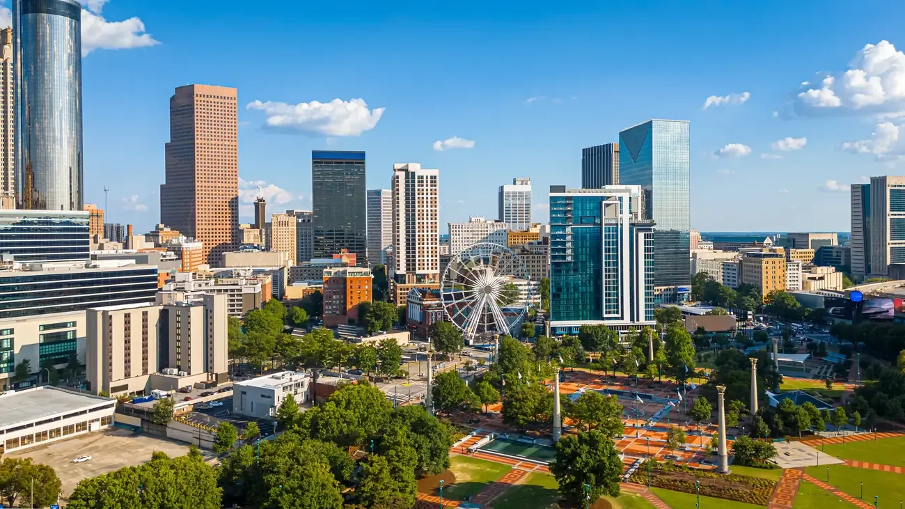 Aerial view of downtown Atlanta with the ferris wheel and Centennial Olympic Park