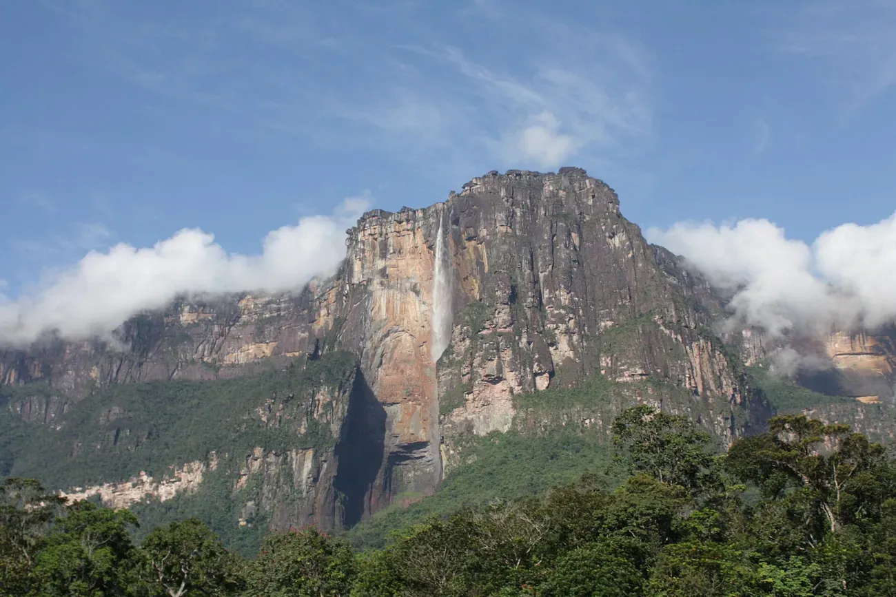 The table mountain Auyán-tepui with Angel Falls seen from the savanna below