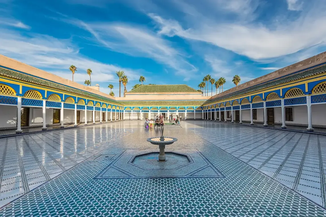 The large tiled courtyard and central fountain of the Bahia Palace in Marrakech