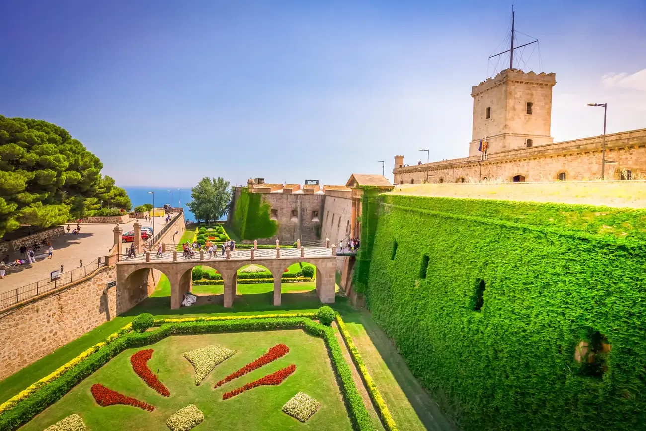 The stone walls and moat of Montjuic Castle in Barcelona