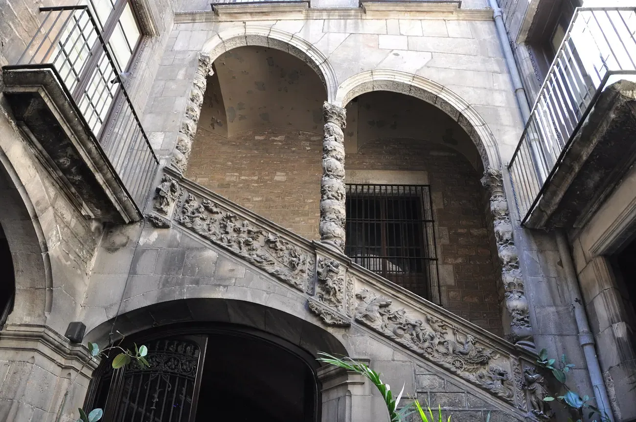 Baroque courtyard staircase of Palau Dalmases in Barcelona