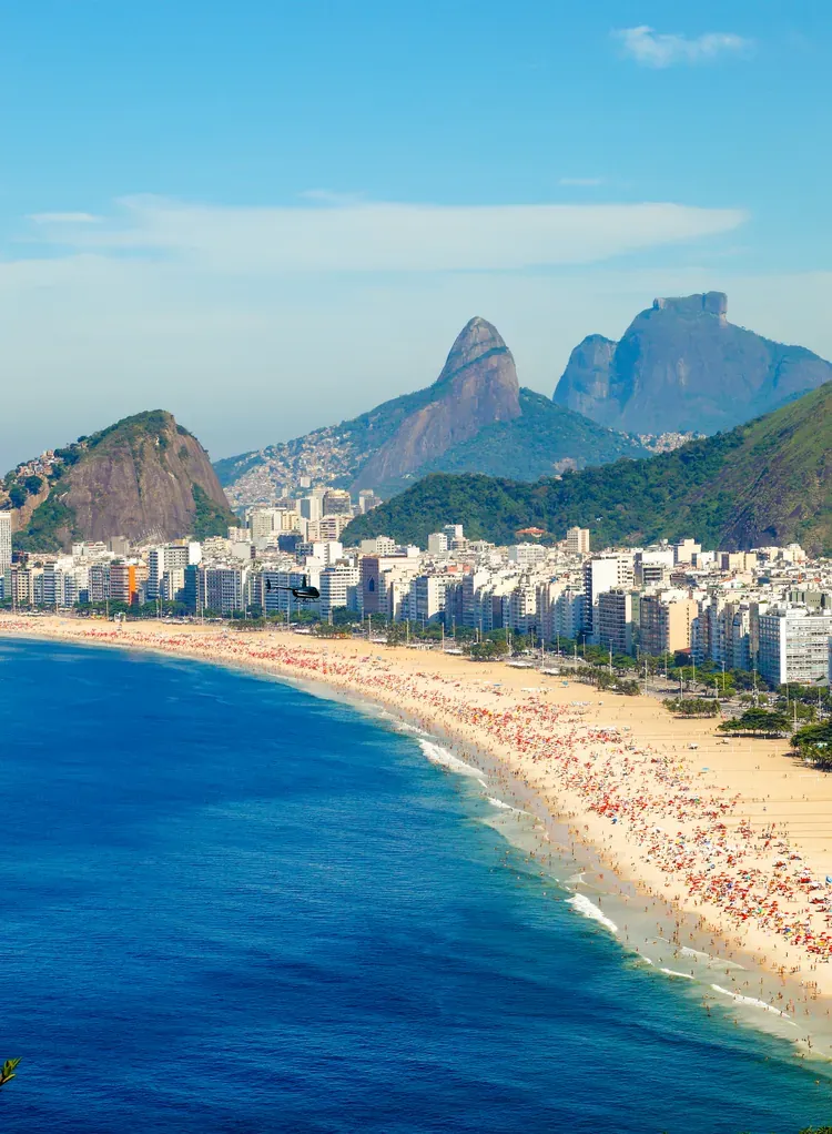A city beach below the Dois Irmaos mountains, Rio de Janeiro