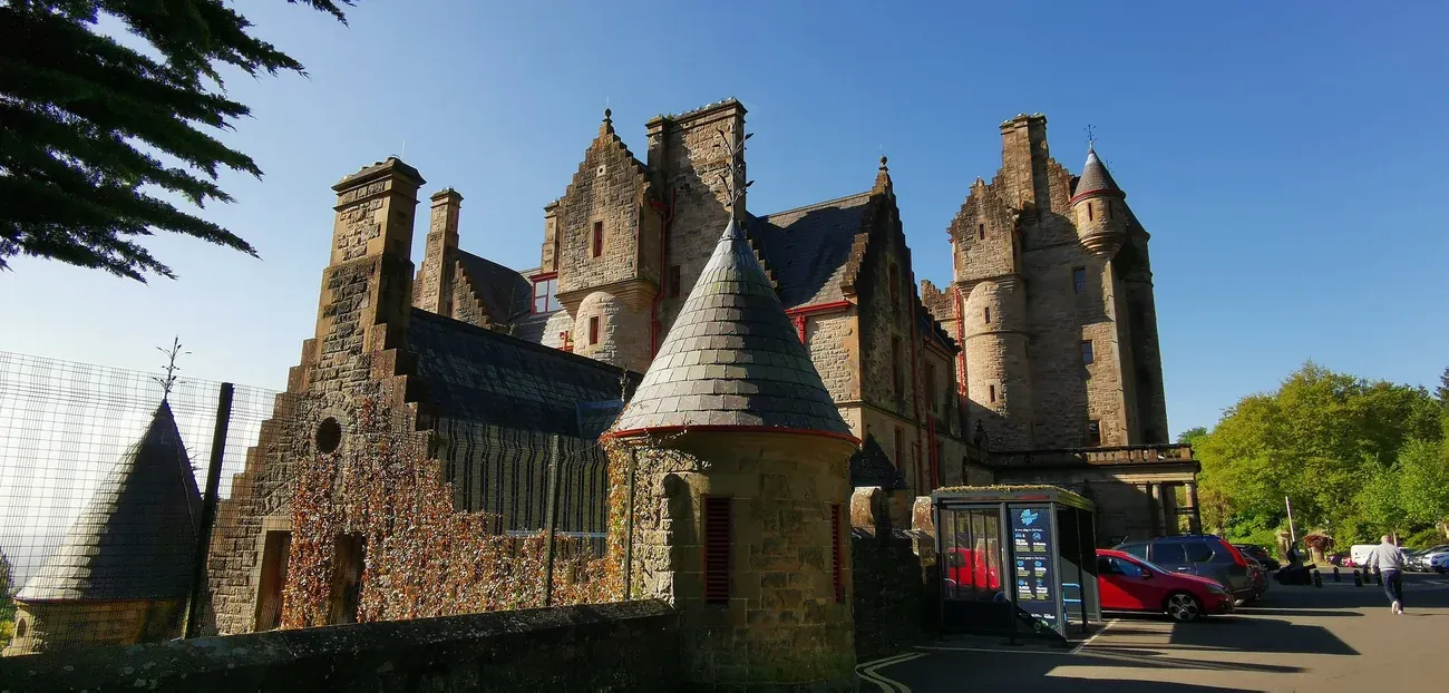 Belfast Castle, a sandstone house with turrets on the slopes of Cave Hill in north Belfast
