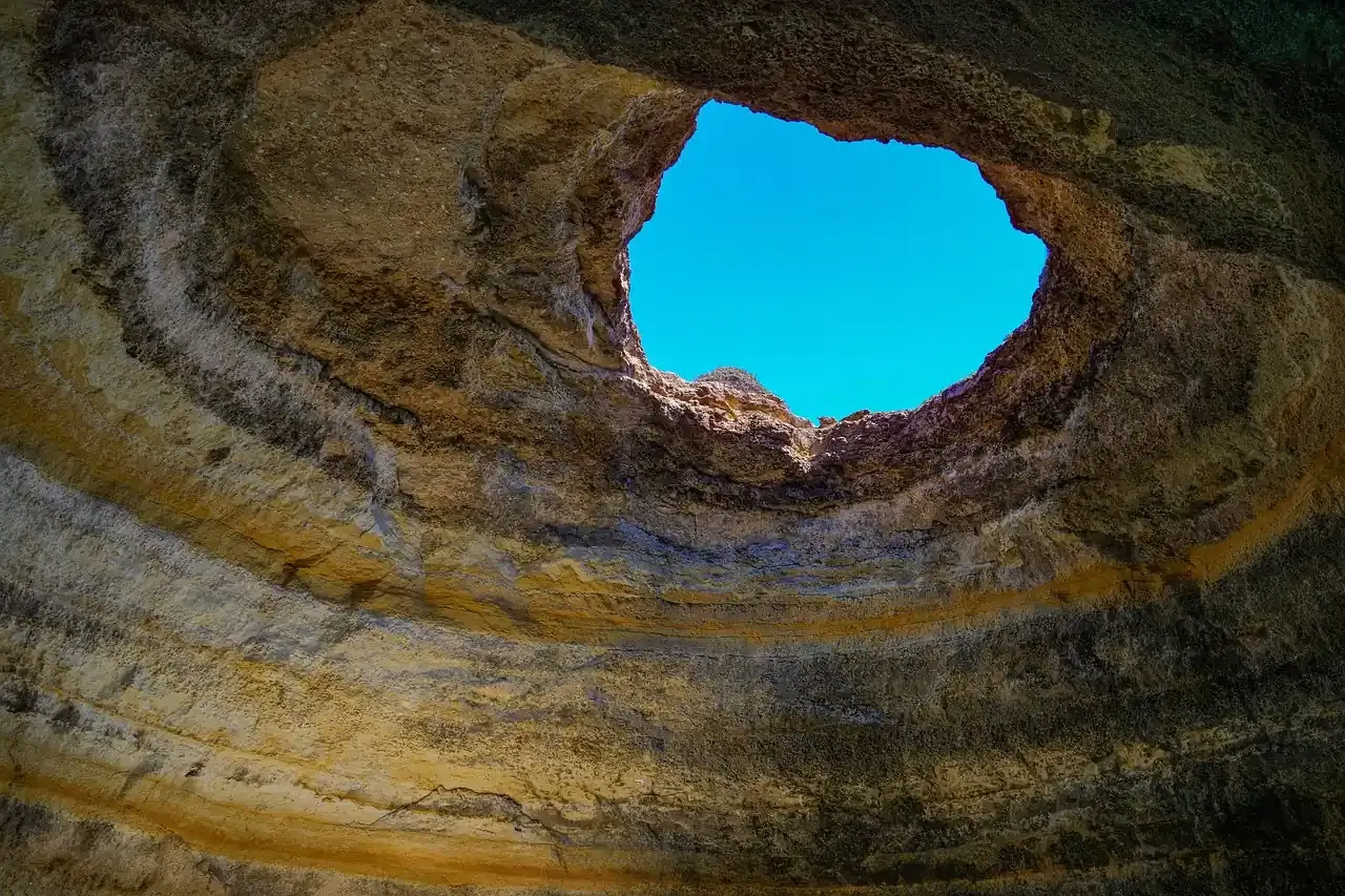 The circular skylight in the roof of the Benagil sea cave