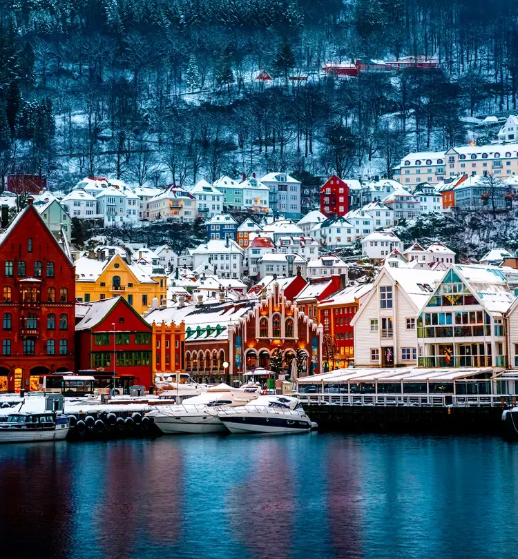 The colourful Bryggen wharf houses in Bergen, Norway, dusted with snow