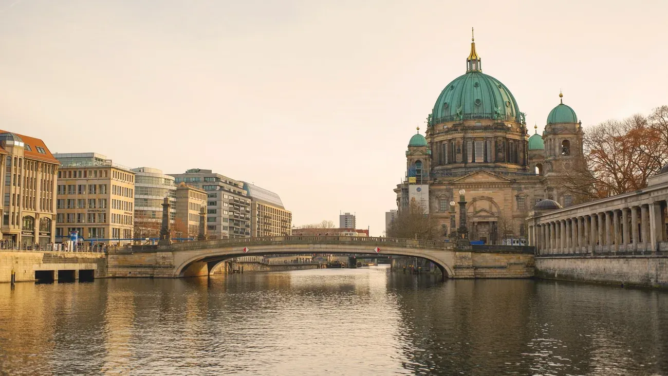 Berlin Cathedral and bridge over the Spree River at golden hour