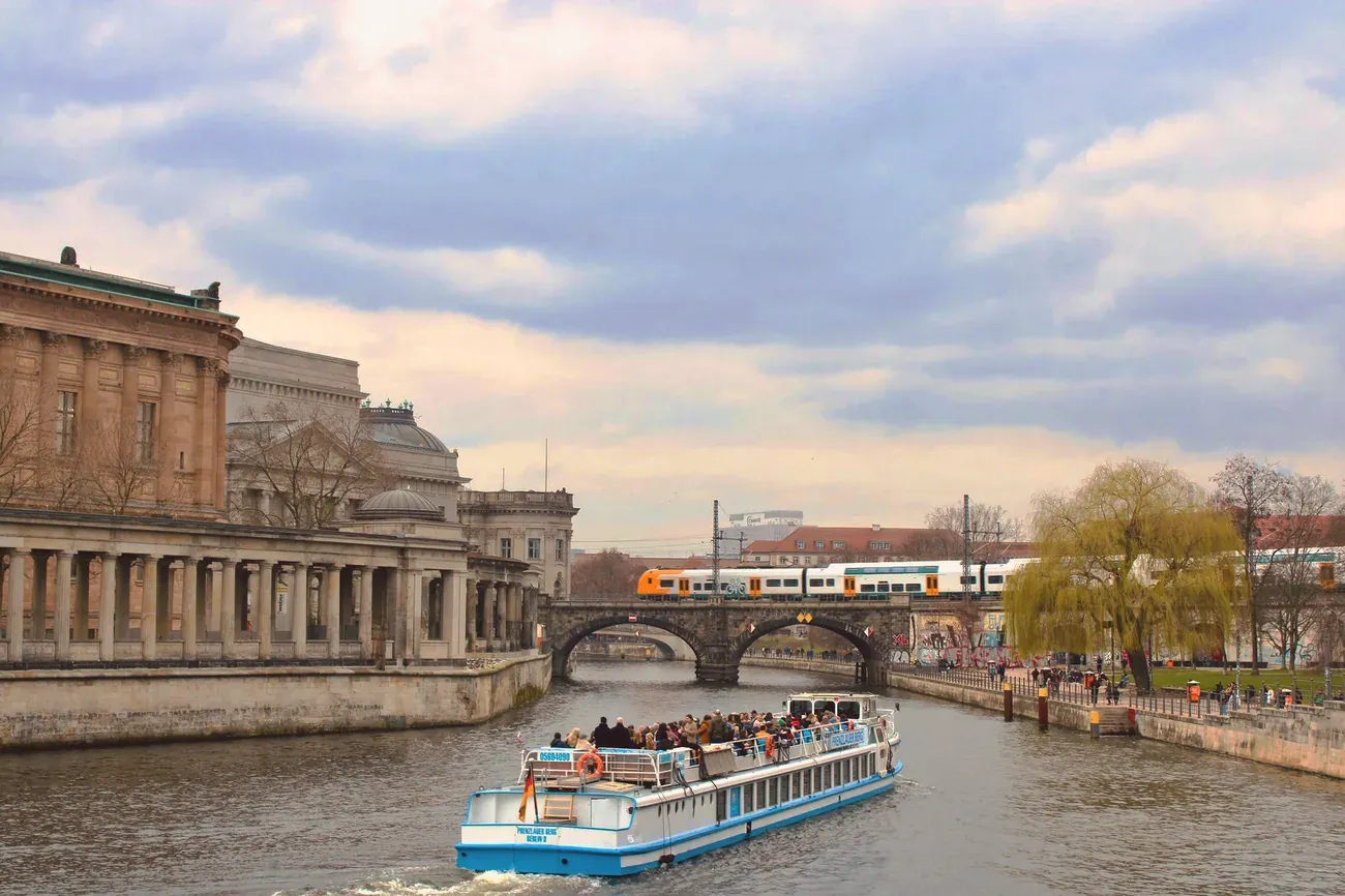 Tourists on a scenic boat ride past Museum Island in central Berlin