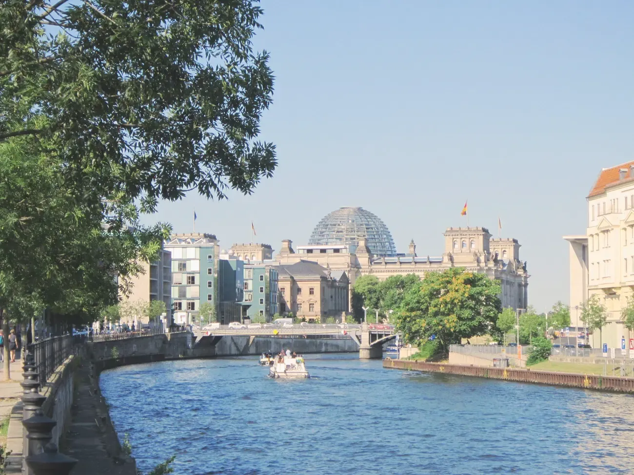 The Reichstag building seen from a Spree River cruise boat