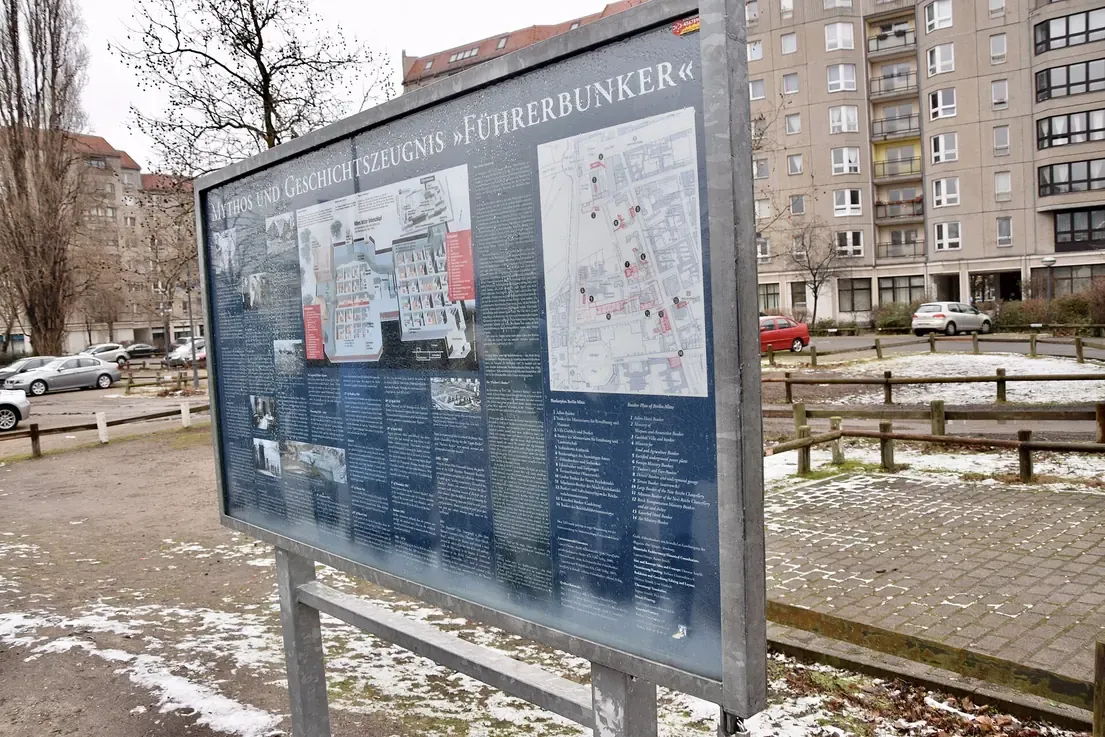 The residential parking lot in Berlin with the permanent information board marking the site of Hitler's bunker