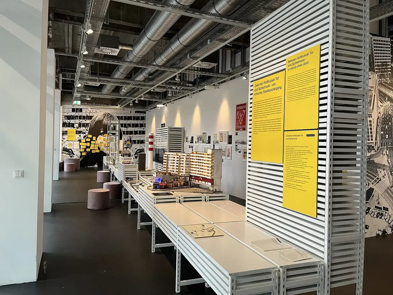 Display panels and shelving inside the Museum der Dinge collection of mass produced objects in Berlin