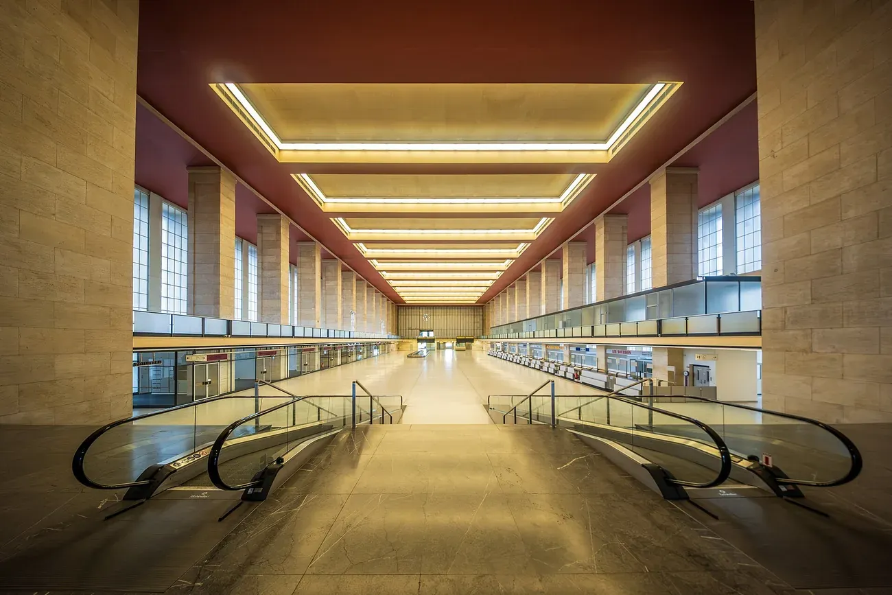 The grand check-in hall inside the 1930s terminal building of Tempelhof Airport in Berlin