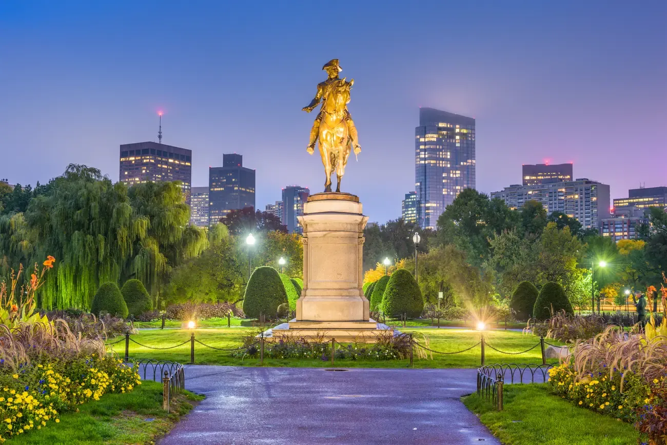 The George Washington equestrian statue lit at dusk in Boston Public Garden