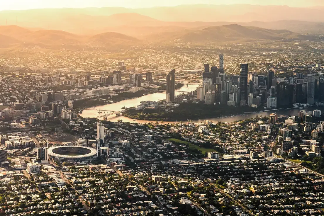 Golden glow aerial view of Brisbane city from above