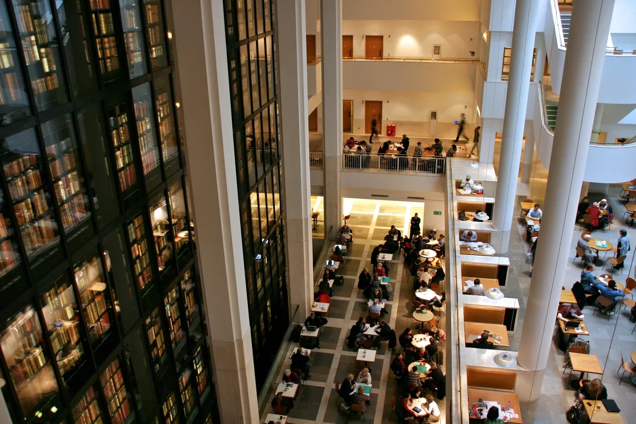 The glass-walled King's Library tower rising through the British Library at St Pancras in London