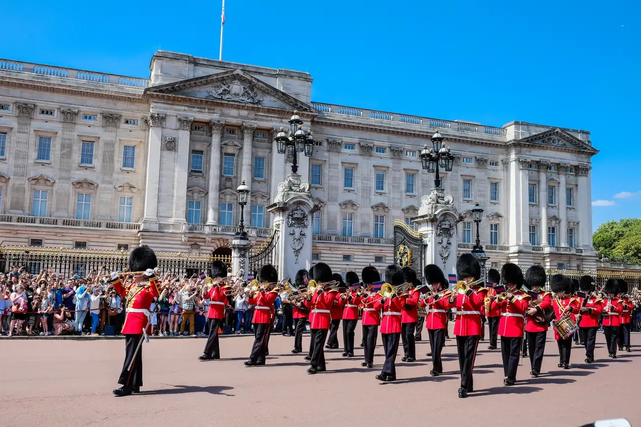 Royal guards and a military band outside Buckingham Palace, London