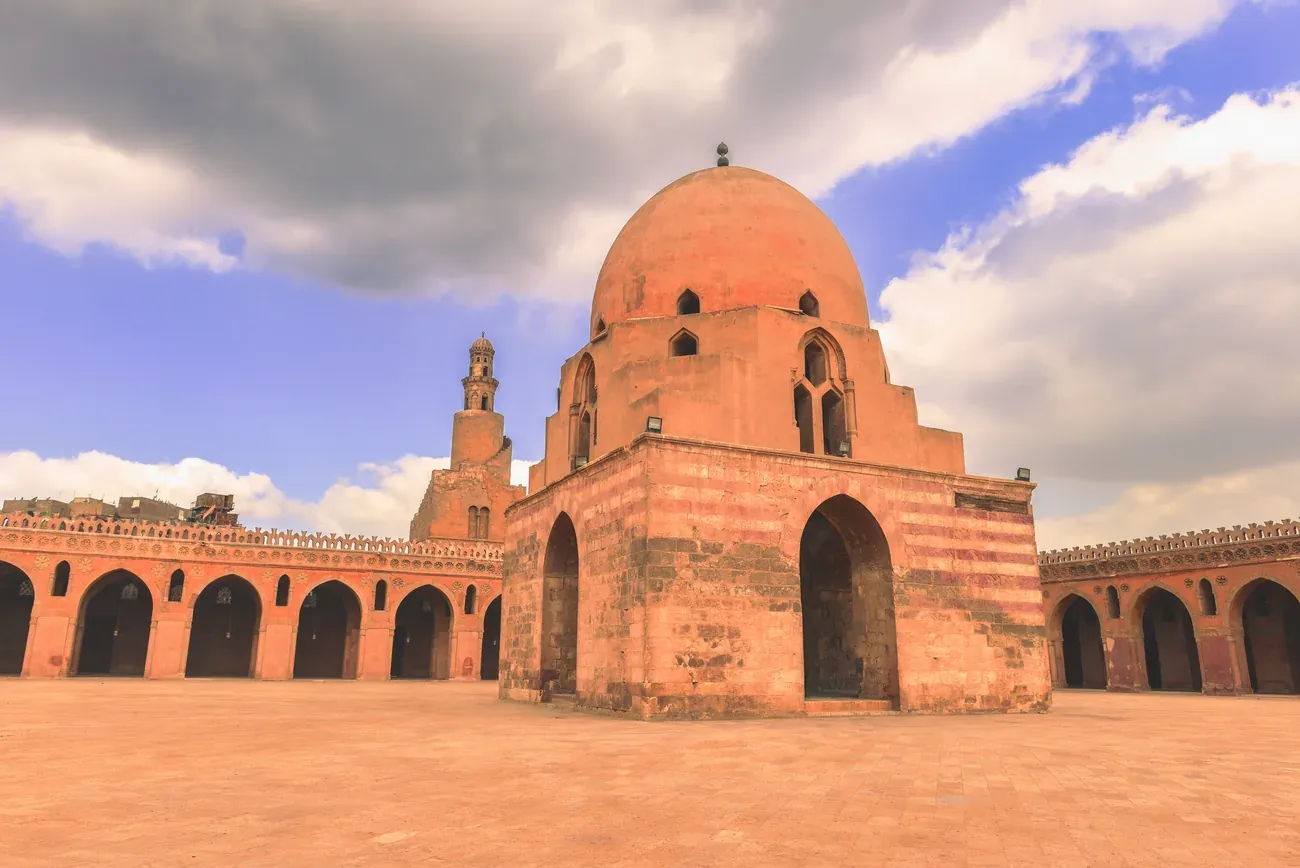 The spiral minaret and arcade of the Mosque of Ibn Tulun in Cairo
