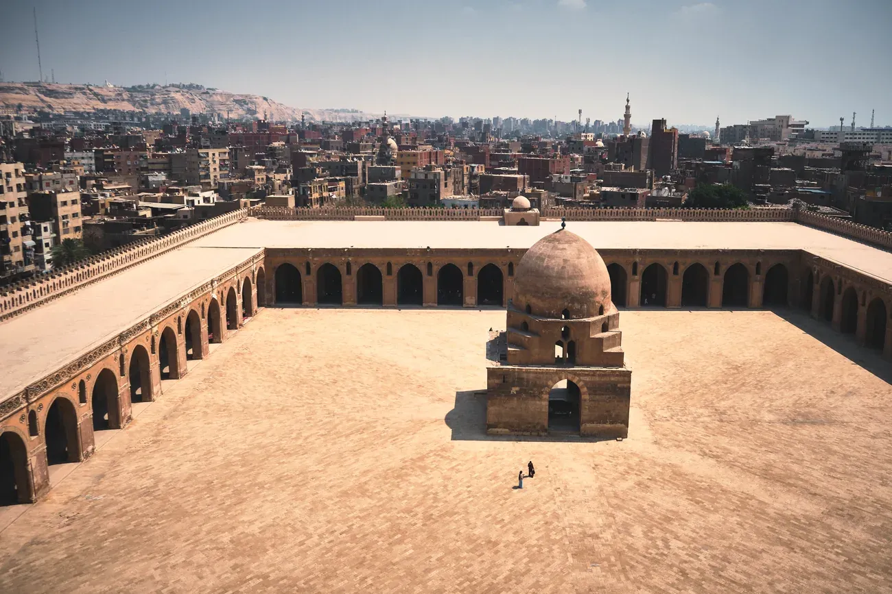 The vast courtyard and ablution dome of the Mosque of Ibn Tulun in Cairo