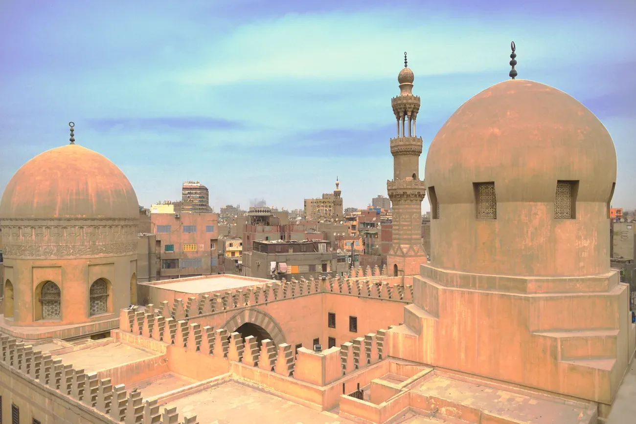 The minaret and domes of the Mosque of Ibn Tulun above the Cairo skyline