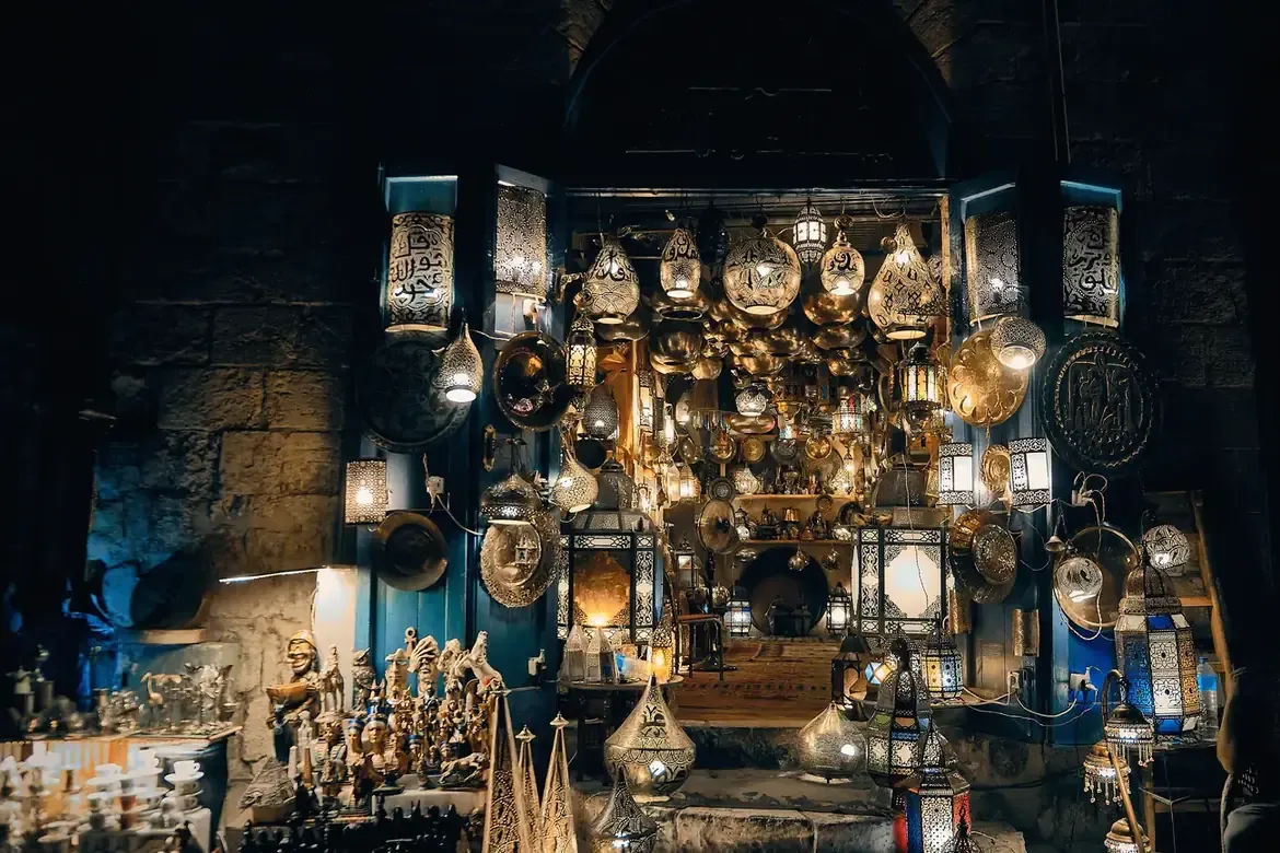 Glowing Arabic lanterns on display at a Khan el-Khalili souvenir shop in Cairo