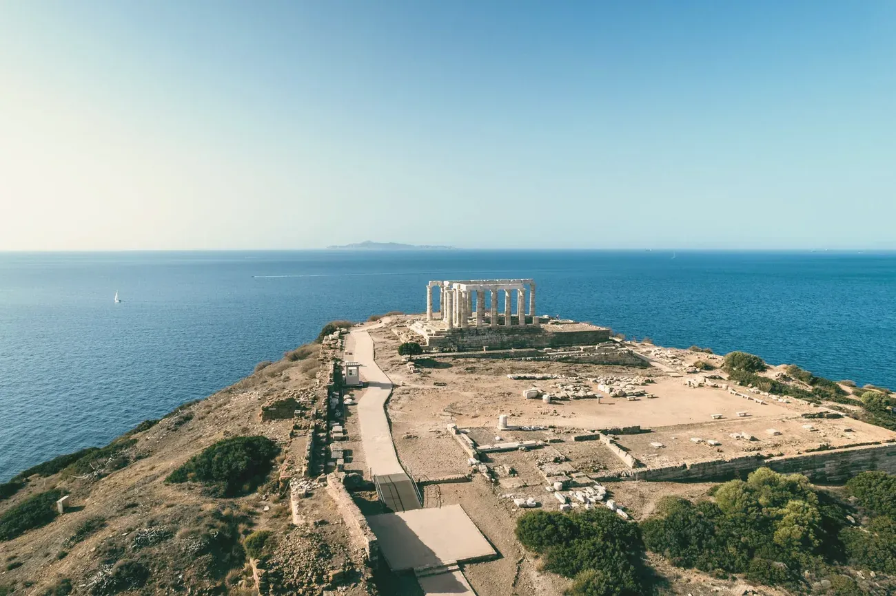 Aerial view of Cape Sounion and the Temple of Poseidon above the Aegean Sea