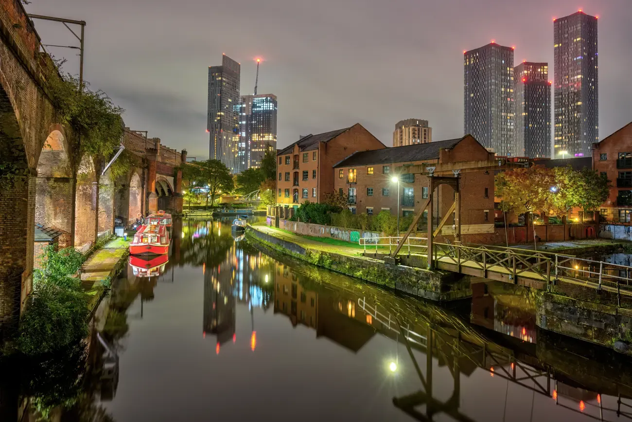 The Castlefield canal basin and skyline at dusk, Manchester