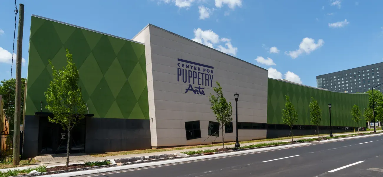 The green geometric facade of the Center for Puppetry Arts in Atlanta