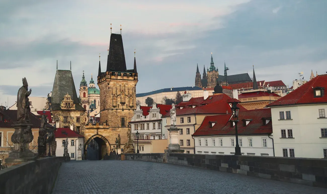 Charles Bridge and the Prague skyline at dawn