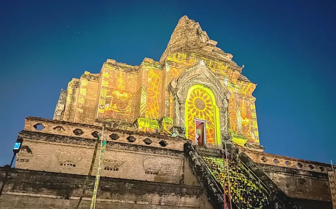 A light projection on the chedi of Wat Chedi Luang at night in Chiang Mai