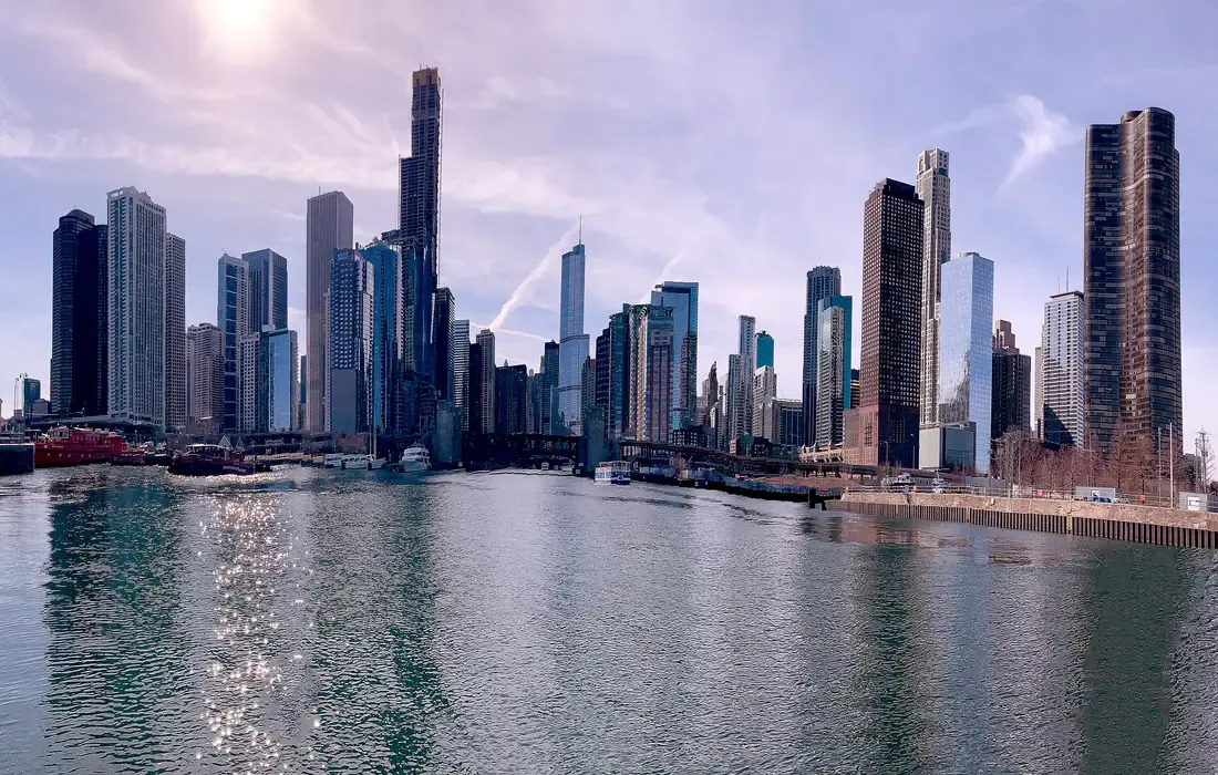 Downtown Chicago towers rising above the water on a bright winter day