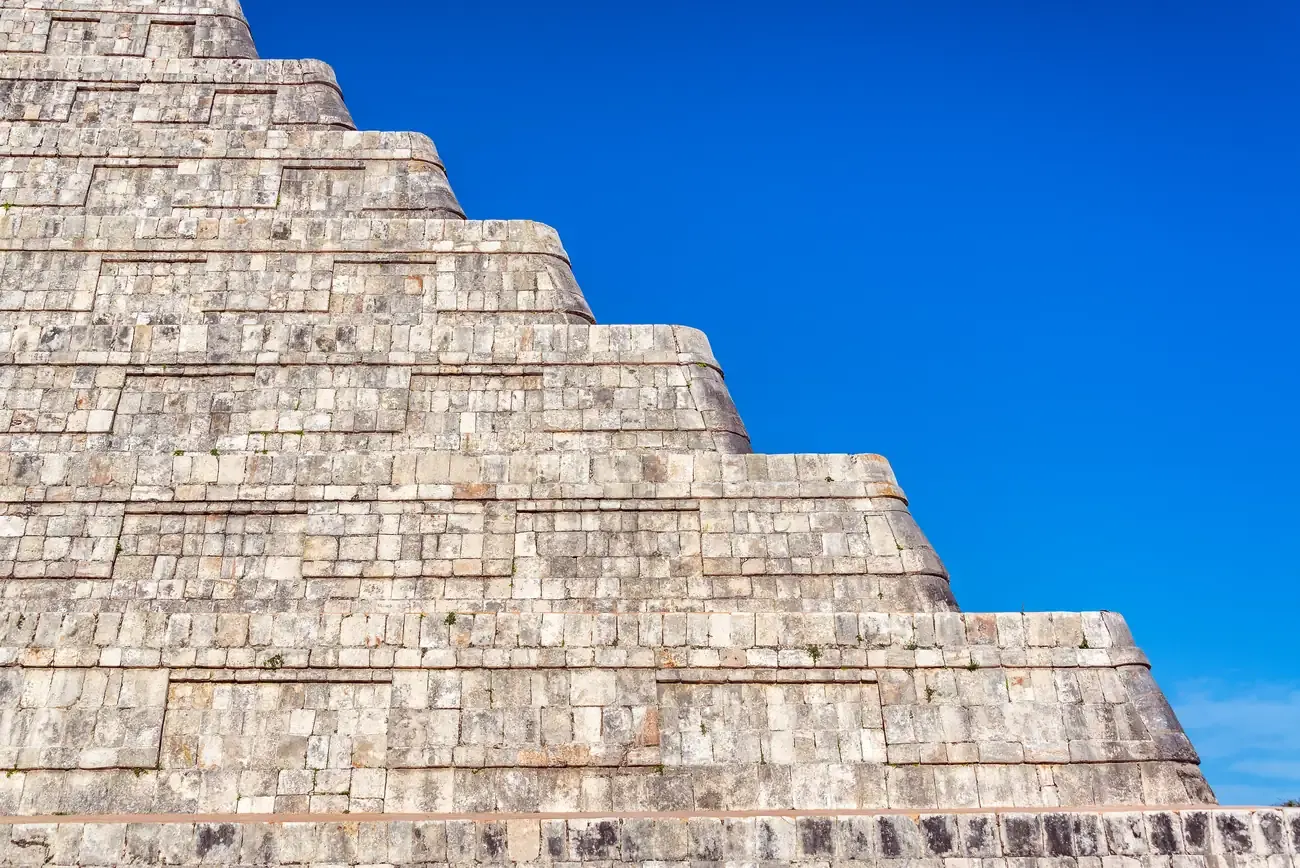 The stepped platforms of a pyramid at Chichen Itza, Mexico