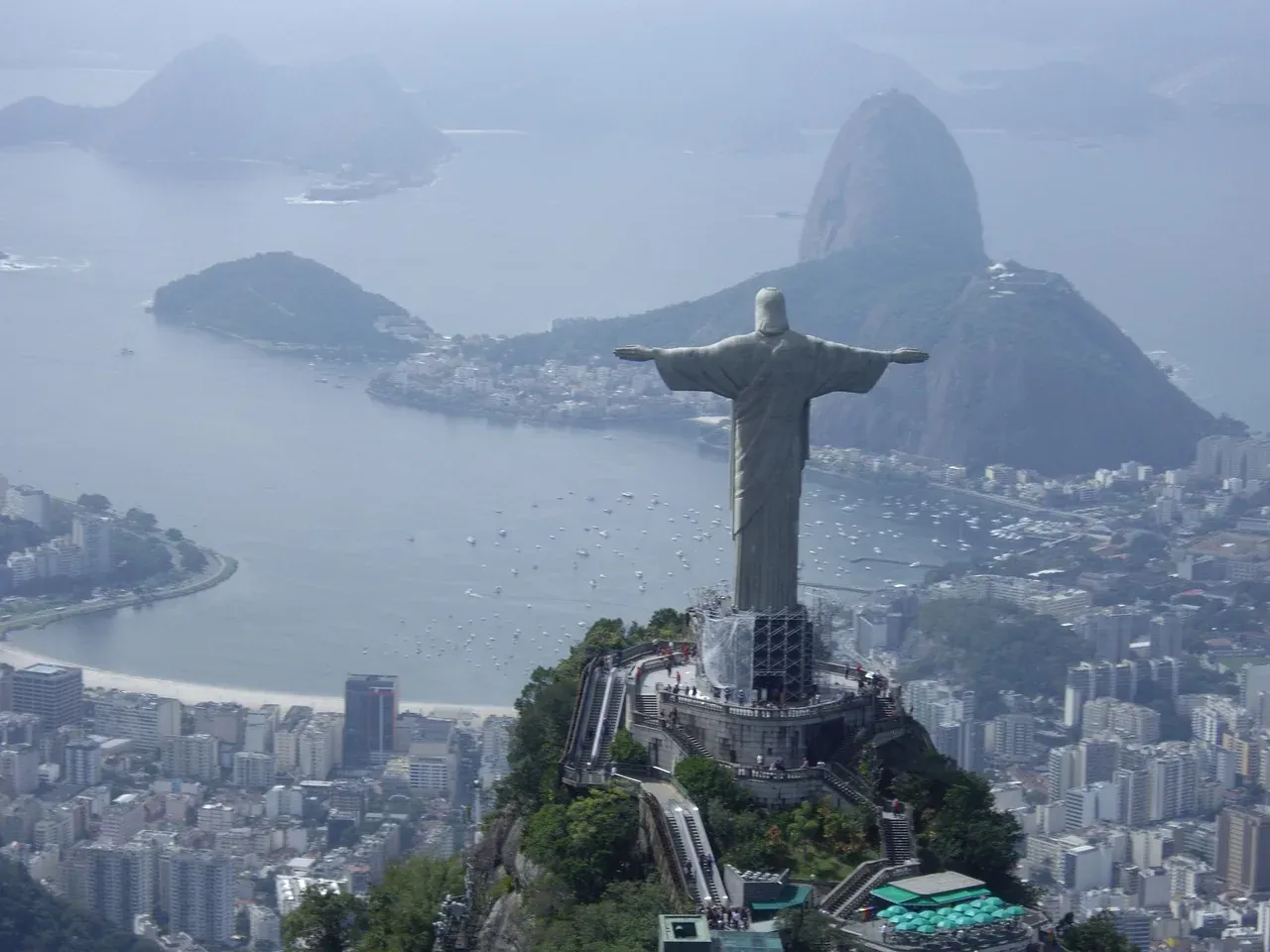 Christ the Redeemer on Corcovado with Guanabara Bay behind it