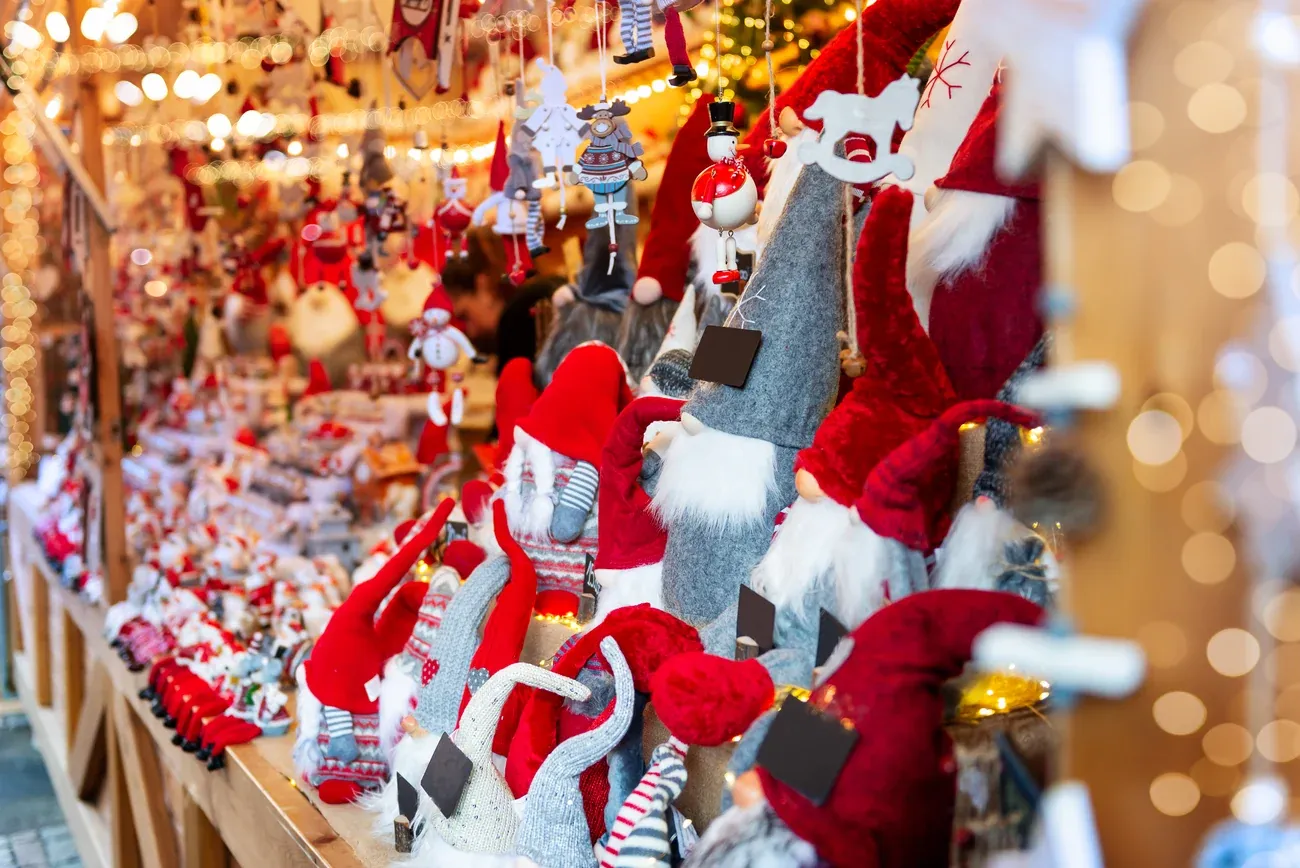 Christmas gnomes and hanging decorations on a market stall at the Albert Square Christmas market, Manchester