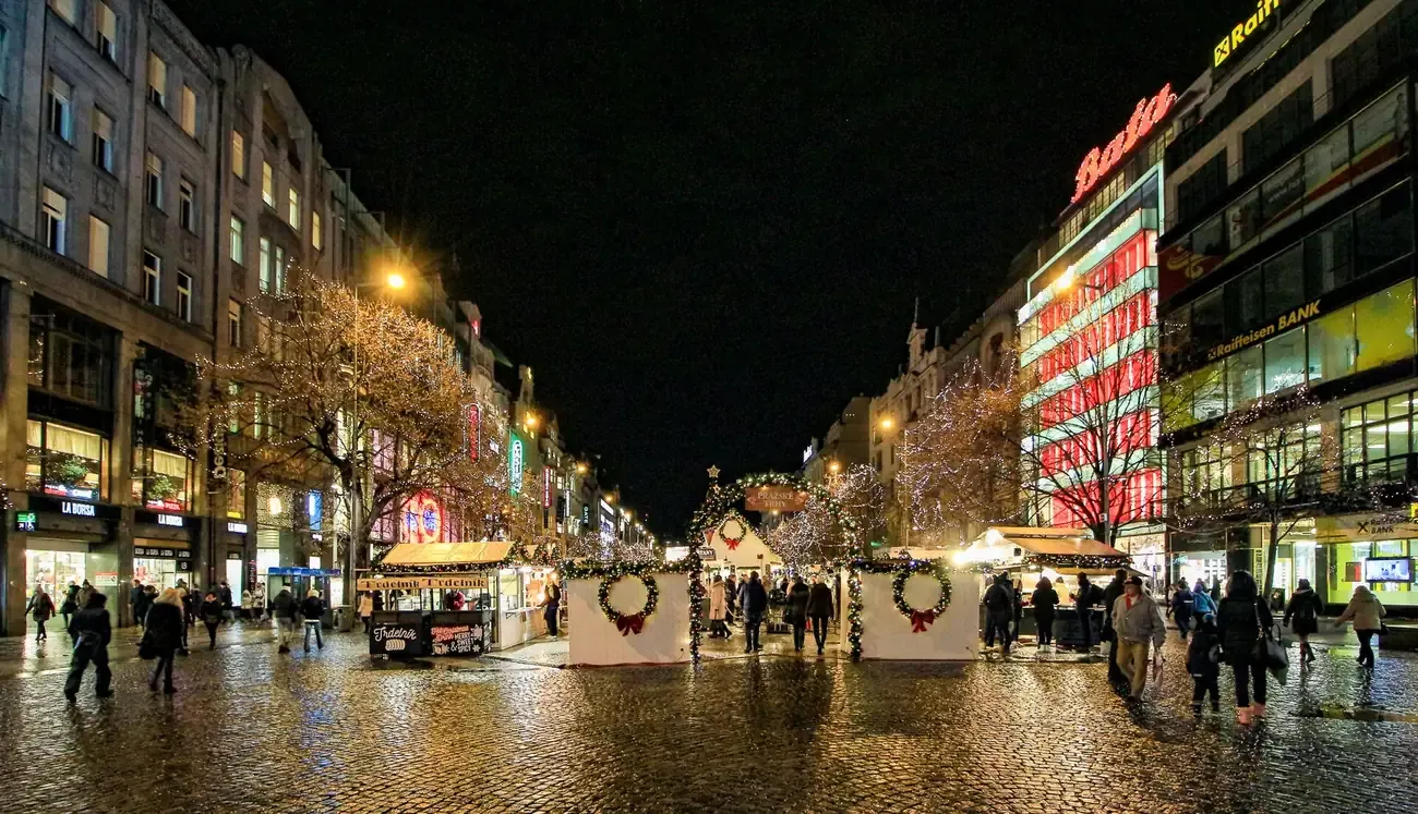 Christmas market huts along the lower part of Wenceslas Square at night, Prague