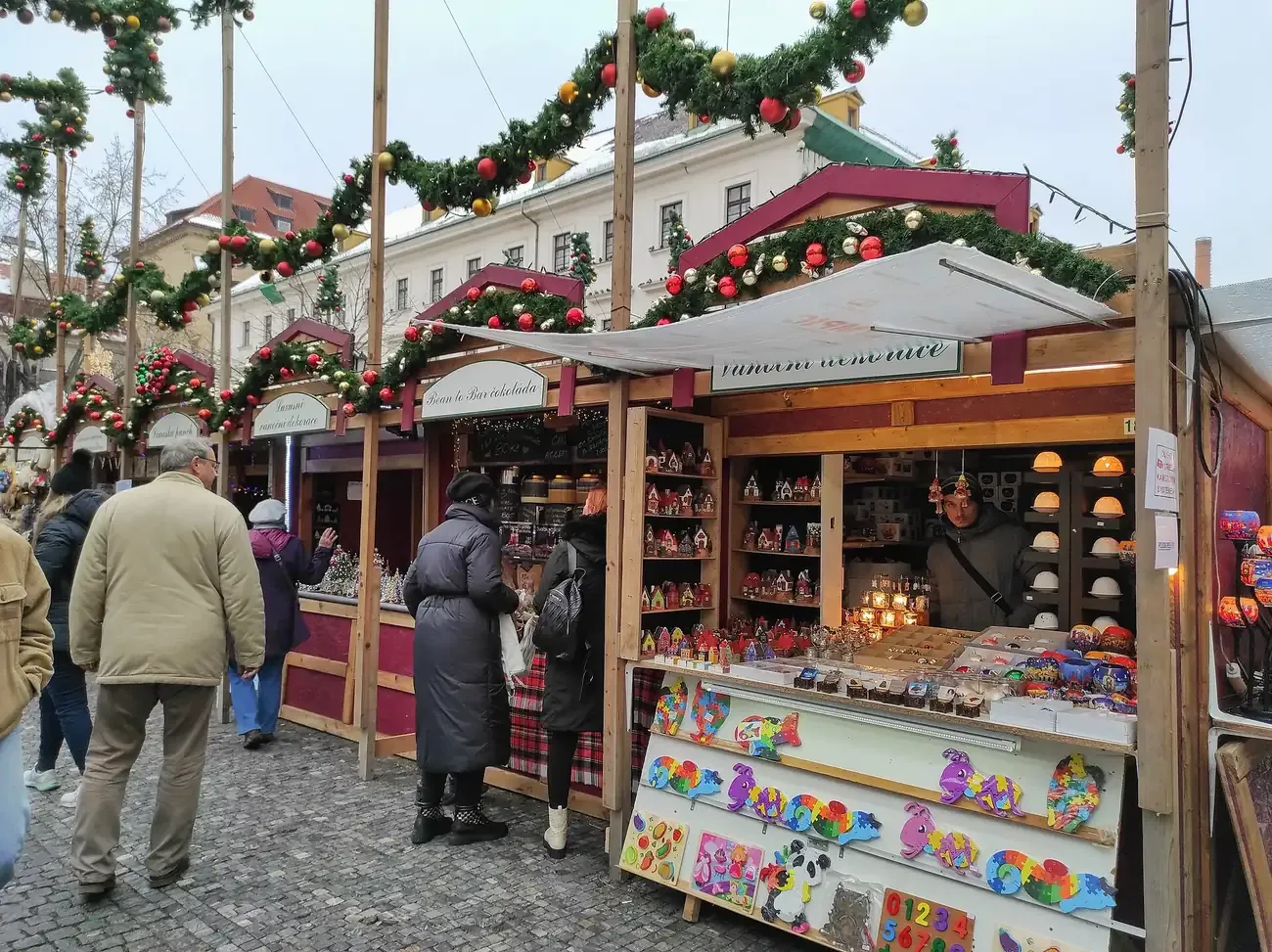 Garlanded wooden stalls of the Christmas market on náměstí Republiky, Prague