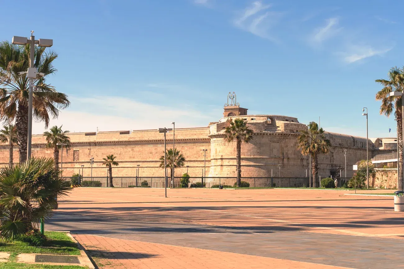 Forte Michelangelo seen from the palm-lined esplanade in Civitavecchia, Italy