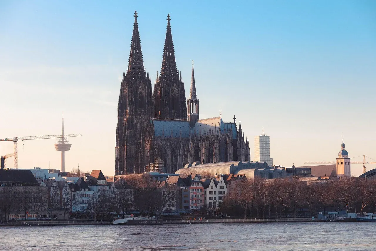 Cologne Cathedral rising above the roofs of the old town in Cologne