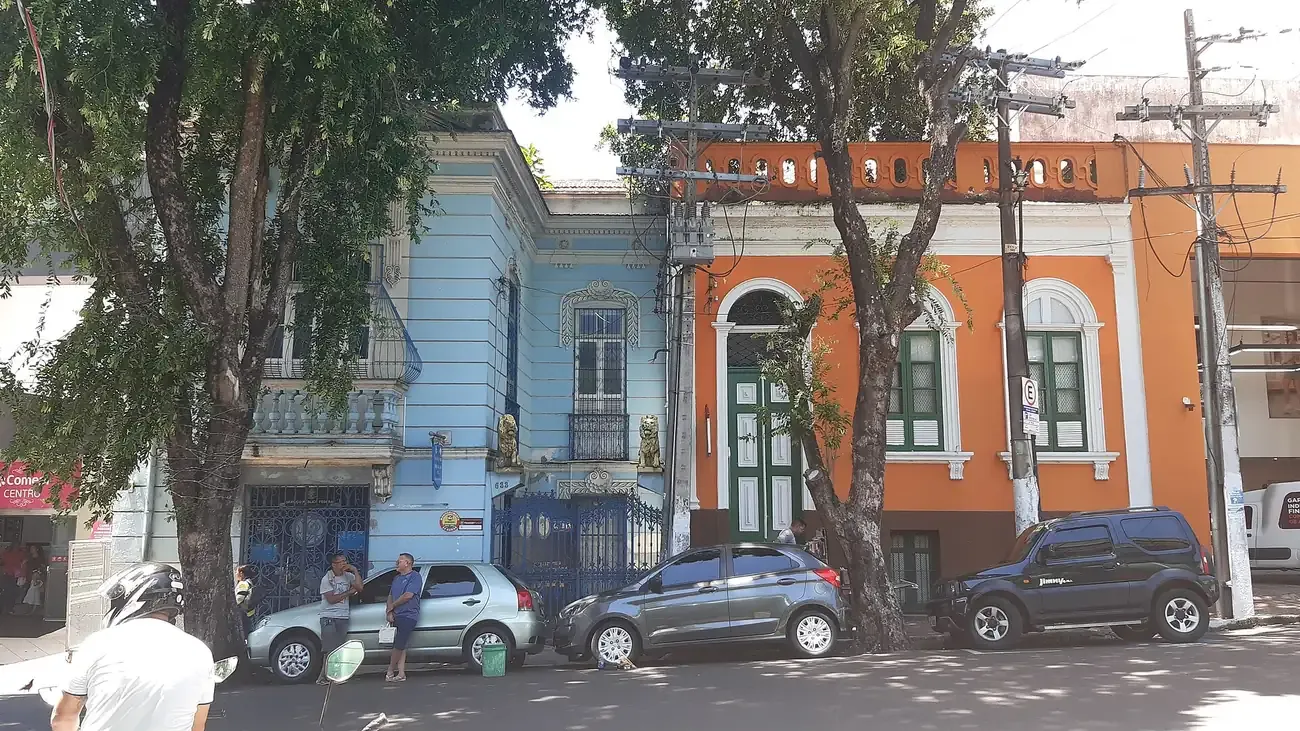 Painted colonial buildings on a street in central Manaus