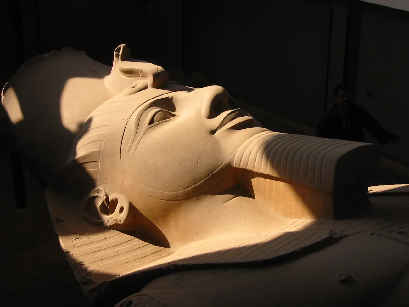 The colossal fallen statue of Ramesses II in the museum at Memphis, Mit Rahina, Egypt