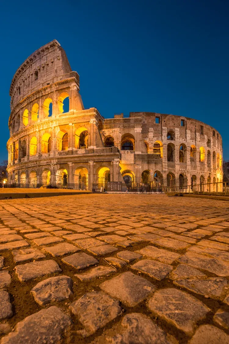 The Colosseum in Rome illuminated at sunset