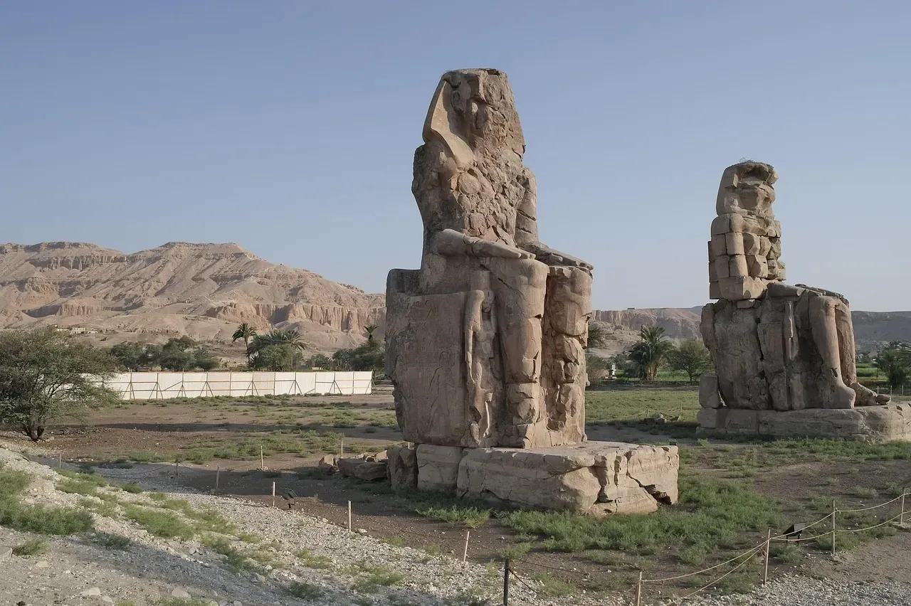 The two Colossi of Memnon standing on the west bank at Luxor