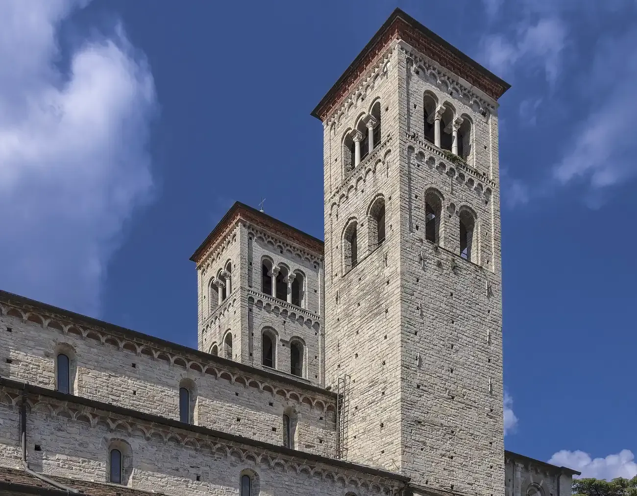 The twin Romanesque bell towers of the Basilica di Sant'Abbondio in Como